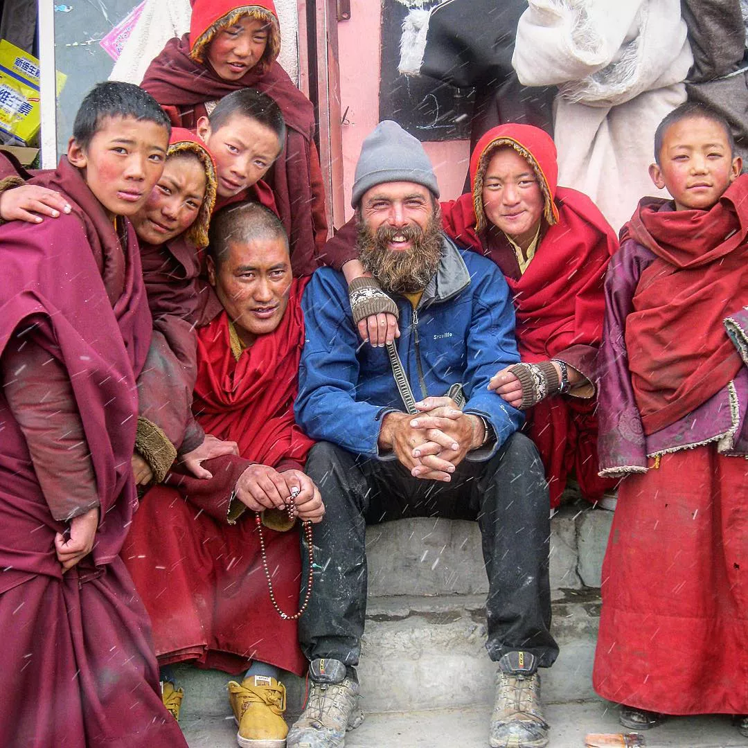 miles raney travelling guide with buddhist monks