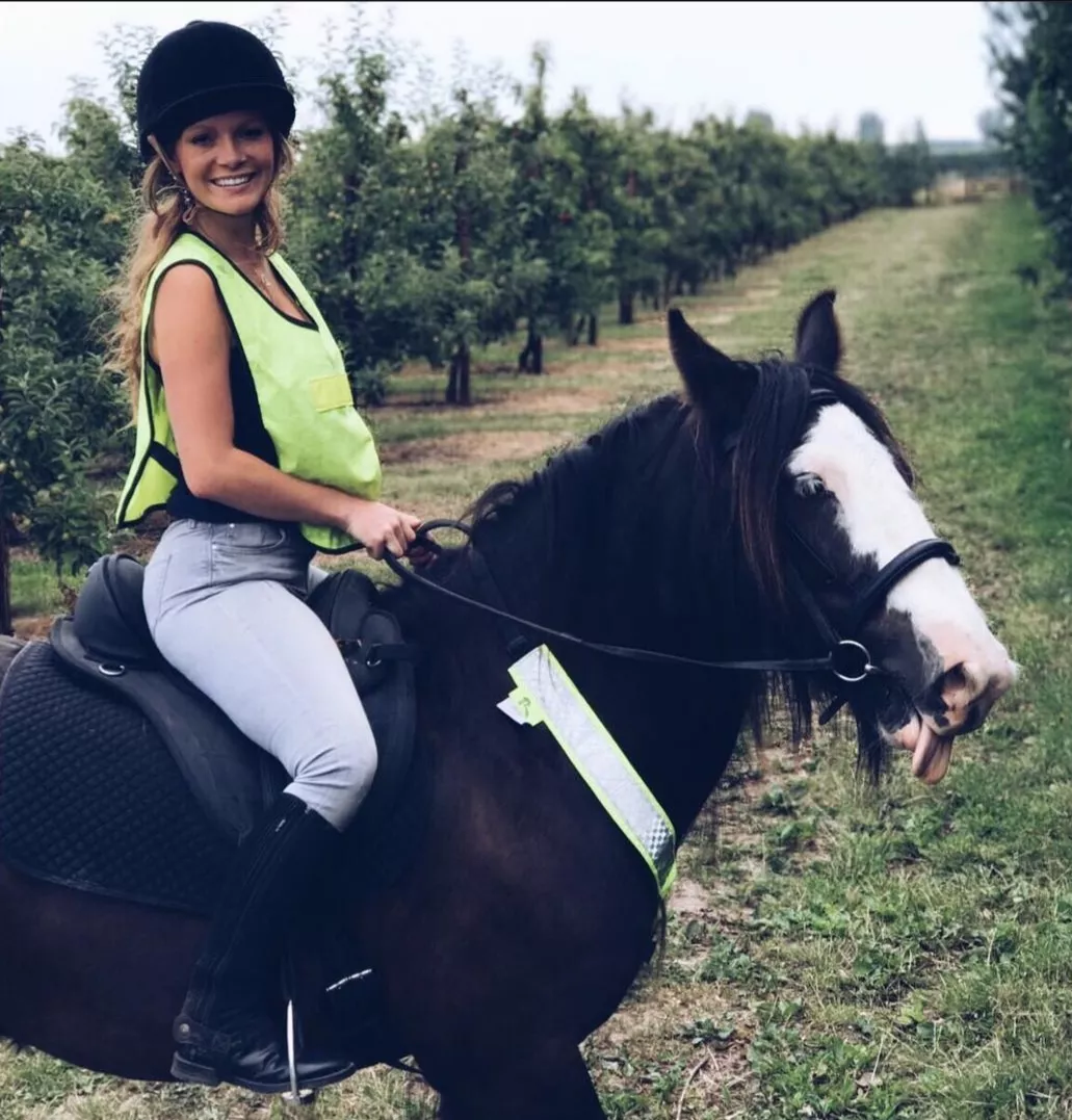 summer monteys fullam on a horse in her farm